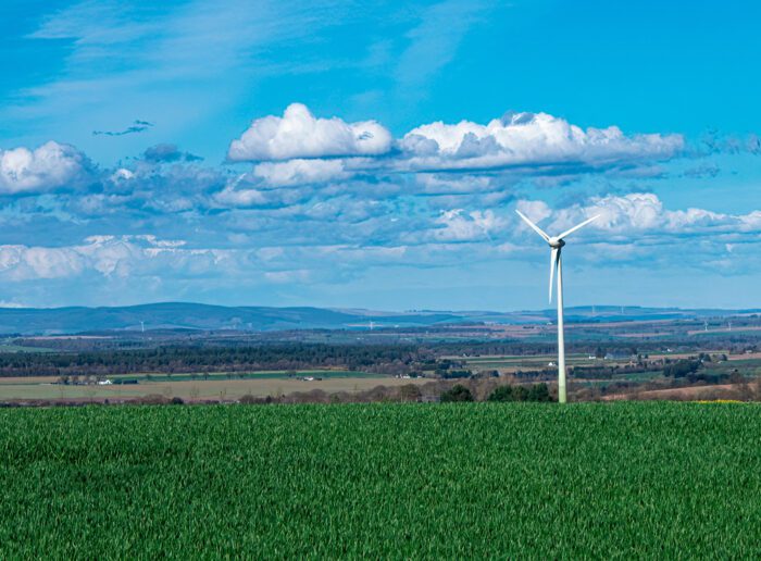 Wind turbine powering a farm in Scotland. The Scottish governmen